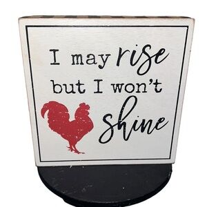 New I may rise but I won’t shine sign